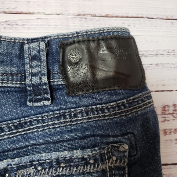 Silver Jeans Aiko Mid Boot Cut Distressed with embroidery and studs. - Picture 8 of 16